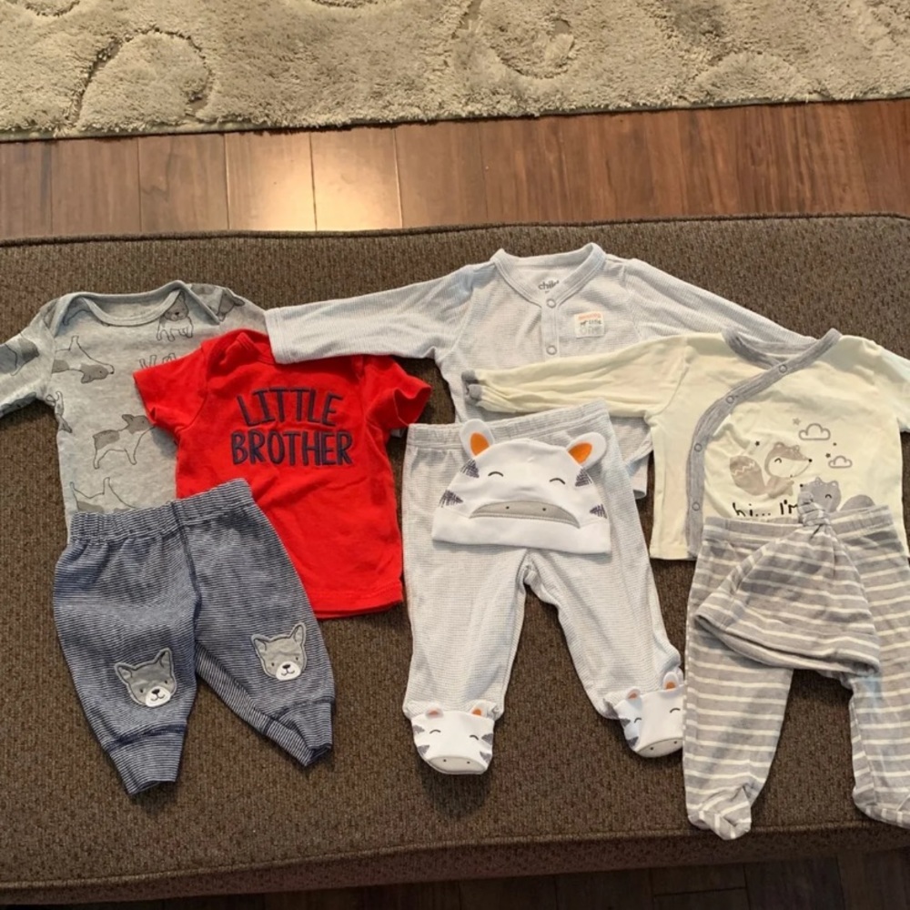 Three 0-3 month outfits